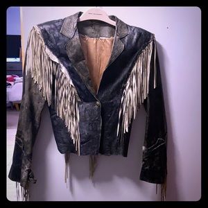Vintage handmade distressed leather fringe jacket